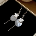Detail of floral earrings with shell discs and chain tassels on black velvet box - Glass Bead Flower Round Shell Tassel Ear Hook (7#)