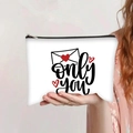 Close-up of white canvas makeup bag with heart envelope print and 'Only You' text detail - Envelope Heart Only You (jiayingpbb0344)