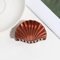 Detailed view of dark brown shell-shaped hair claw with glitter finish on white background - Small / Orange Red
