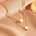 Collar de doble capa en acero inoxidable dorado con perla blanca y colgante de estrella - Dorado