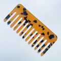Amber tortoiseshell acrylic wide tooth comb with smooth marble pattern finish - Leopard Print