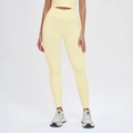 Seamless light yellow high-waisted yoga set with ribbed texture and cropped tank top - Moonlight Yellow
