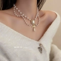 French vintage double-layer pearl necklace with gold heart pendant and bow detail - 52# Necklace - Gold Vintage Oval Pearl Double Layer Drop