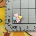 Detailed view of mini resin balloon charms for DIY crafts shown next to a metric ruler - Mini Bear Balloon