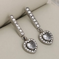 Silver stainless steel double-layer earrings with sparkling heart-shaped tassels on beige velvet - Steel Heart