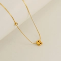 Golden titanium steel chain with a chubby letter R pendant and a small white zircon stone - Letter R