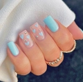 Detail of light blue heart pattern nails with silver rhinestones on square shaped press-ons - Blue Pink Heart Style (With Yellow Jelly Glue Set)