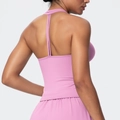 Close-up of pink sports bra showing the racerback detail and soft brushed fabric - Rose Pink