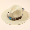 Cappello da sole in paglia beige bohémien con perline turchesi ed nappe su sfondo neutro - M (56-58cm) / Beige
