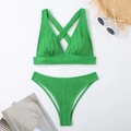 Detailed view of green ribbed bikini with halter straps on white background - S / Green
