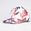 Detailed view of the watercolor floral print and fabric texture on a white baseball cap - Adjustable / Purple Watercolor Small Floral (03)