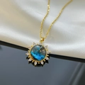 Macro shot of solar flower necklace with star-themed blue gemstone and golden chain - Gold + Cross Chain - Sunflower Starry Sky