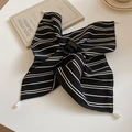 Detail of black and white striped fabric hair claw clip with elegant pearl embellishments - Hair Claw / Black