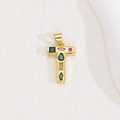 Macro detail of gold T-letter pendant featuring vibrant multi-color zircon stones - Letter T
