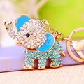 Elephant keychain in gold metal with blue rhinestones and blue enamel ear finish - Single OPP Bag Packaging / Full Rhinestone Elephant Blue