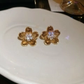 Amber flower stud earrings with gold metal edges and sparkling crystal center - Style 44 Silver Earring Post - Gold - Amber Zirconia Flower