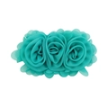 Close-up of handmade turquoise chiffon rose flower hair clip with delicate leaf details - Turquoise