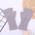 Detailed texture of grey knit arm warmers with ribbed cuffs and soft acrylic material - One Size / Light Gray