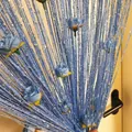 Sky blue glitter string curtain with rose floral accents and silver threads for room decor - Blue