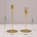 Set of two gold metal candle holders in different heights for home table decor - Gold Pillar Candlestick Set High and Short