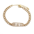 Bracelet étoile plaqué or ajustable avec incrustation de zircone sur fond blanc - Bracelet Étoile