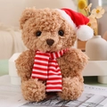 Brown Christmas plush bear toy with red Santa hat and striped scarf on desk - 23CM / Red Striped Scarf & Christmas Hat