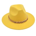 Detail of yellow wool felt fedora featuring a decorative gold chunky metal chain link - Yellow