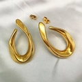 Macro detail of high-polish 18K gold-plated fluid metal drop earrings on white silk - Gold - Liquid Metal Streamlined Teardrop