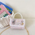 Pink tweed crossbody bag for girls with pearl handle and decorative bow and charms - Blue Rabbit