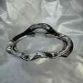 Metallic silver shark hair clip with irregular wave design and visible spring structure - Cloud Claw Silver 11cm
