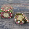 Scented soy candle in a mandala metal tin with matching gift box on wood surface - Vanilla Cream (Tin)