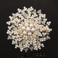Macro shot of luxury handmade snowflake brooch with white pearls and crystals - Crystal Pearl Snowflake Style E