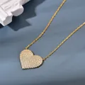Elegante goldene Herz-Halskette mit glänzenden weißen Kristallen auf einer feinen Kette - 925er Silber / Gold