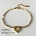 14K gold plated tennis bracelet featuring a hollow heart charm and zircon stones - Hollow Heart Pendant Tennis Chain (XBL0037-2)