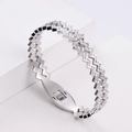 Silver zigzag geometric bangle with pavé crystals and spring hinge closure - Silver