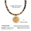Macro shot of stainless steel sun face pendant with leopard print scarf necklace cord - Sun Face Style (YYN025336)