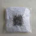 White Halloween spider web decoration set with small black spiders in clear packaging - 200g White Spider Web + 20 Black Spiders