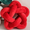 Knot-shaped star throw pillow in vibrant red plush fabric for sofa decoration - Red