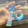 Porte-clés donut bleu en silicone avec breloque arc-en-ciel et sangle wish - Bleu