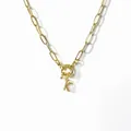Gold paperclip chain necklace featuring a zircon encrusted capital letter K pendant - Letter K