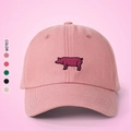 Detailed view of pink pig embroidery on cotton canvas baseball cap with five color options - Deep Pink