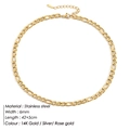 Macro detail of 6mm gold Figaro chain necklace featuring stainless steel links and lobster clasp - Medium Length Chain / Gold