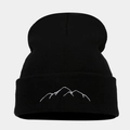 Detailed view of the mountain embroidery on the black ribbed knit beanie's cuff - Black
