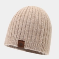 Macro detail of camel rib-knit beanie showing thick wool texture and snowflake leather patch - One Size / Khaki