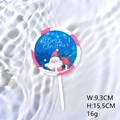 Round acrylic Christmas cake topper featuring Santa Claus and Merry Christmas text - Santa Claus