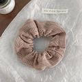 Knitted beige scrunchie with cable texture on white background for autumn hair styling - Light Coffee