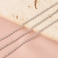 Close-up of 2.4mm silver stainless steel ball chains on a textured stone surface - 2.4MM Thick Steel Color Chain (1 Meter)