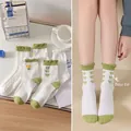 Bow mid-calf socks in white and green featuring tulip embroidery and ribbed cuffs - One Size / Fresh Bowknot