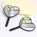 Mini heart-shaped handheld makeup mirror with black plastic frame and portable handle hole - 8x12cm / Black