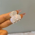Close-up of small iridescent mermaid white acetate hair claw clip held in hand - Small Semicircle Claw Clip (Style 2)
